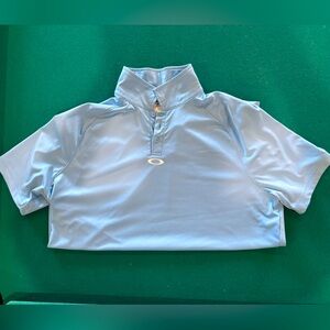 Men’s Oakley light blue color polo size XL. In great condition